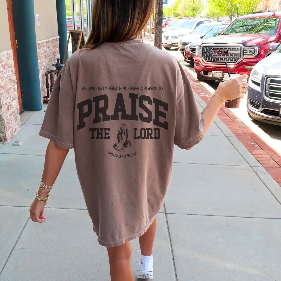 Praise Him oversized tee in relaxed fit, featuring inspirational text on the back, perfect for casual outings.