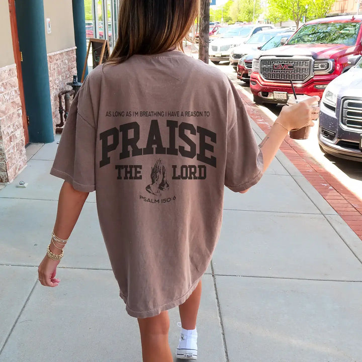 Praise Him oversized tee in relaxed fit, featuring inspirational text on the back, perfect for casual outings.