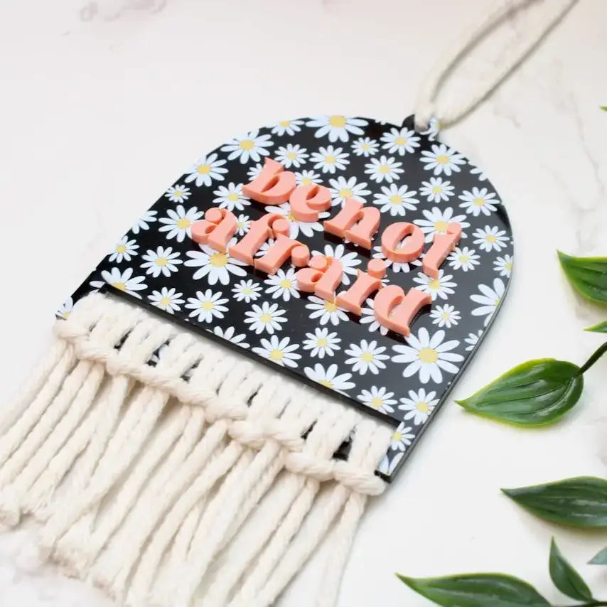 Be Not Afraid Rearview Mirror Charm with daisy design and tassels, uplifting decor for daily positivity.