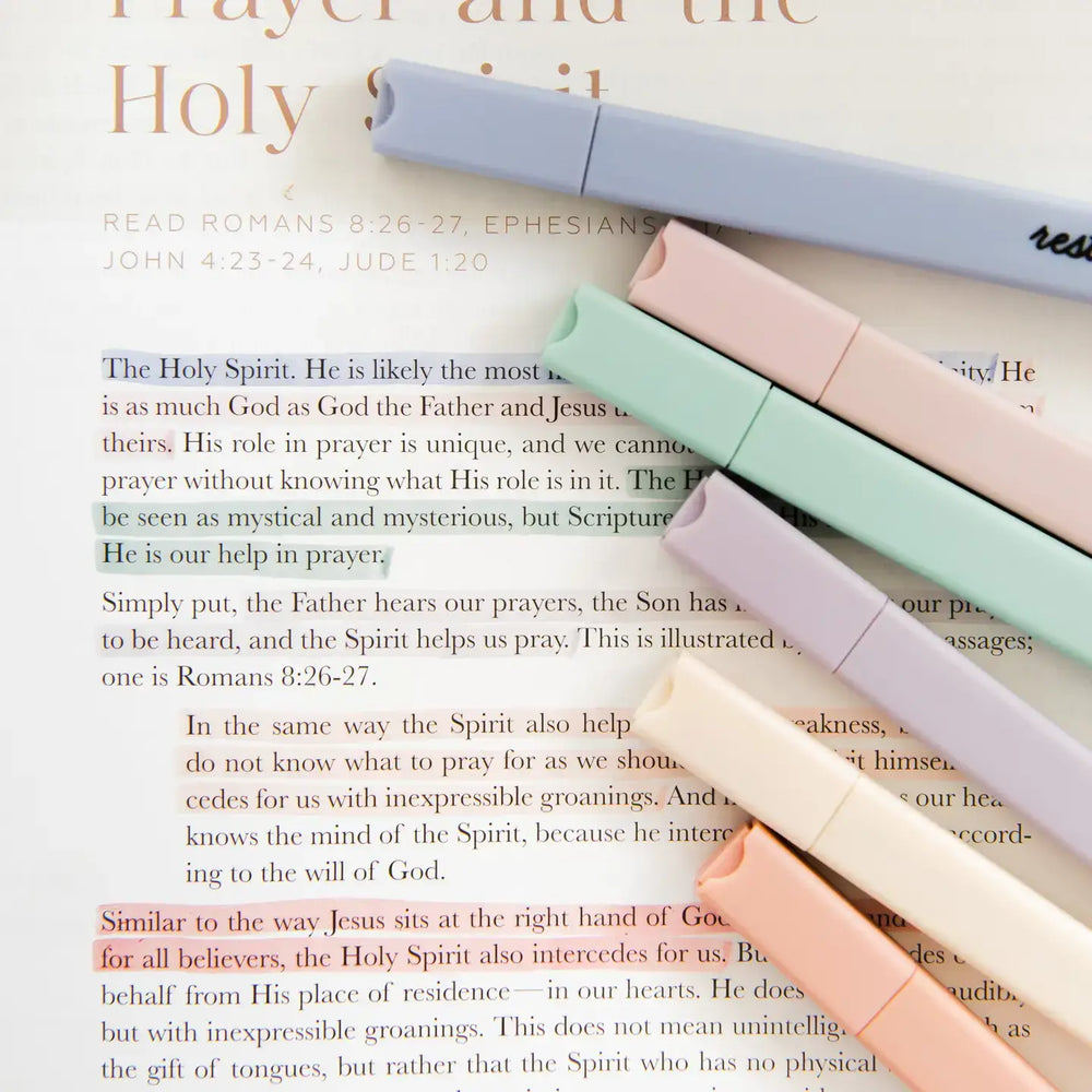 Pastel Bible highlighters in soft colors highlighting scripture text for study and notes.