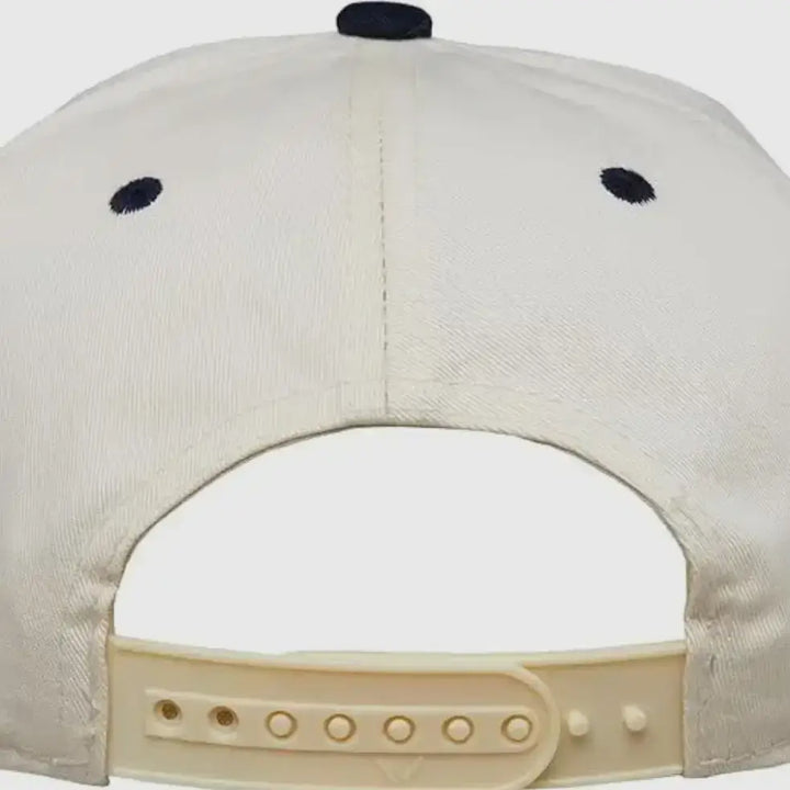 Back view of Made to Worship Embroidered Hat showcasing adjustable snap closure and cream color design.